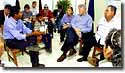 Photo: President Clinton and President Aleman hold a discussion with survivors of the Casito volcano mudslide, Nicaragua.