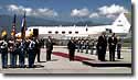 Photo of President Clinton with President Carlos Roberto Flores at Hunduran arrival ceremony, Soto Cano Military Base, Comayagua, Honduras.