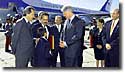  President Clinton is greeted by Mayor Eduardo Costillo and other officials upon his arrival at the Guatemala City Airport.