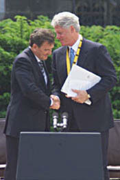 President Clinton shakes hands with German Chancellor Gerhard Schroeder after being presented with the Charlemagne Prize.