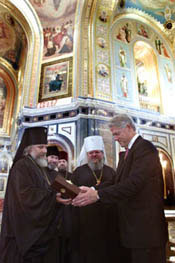 The President is presented with a gift at Christ the Savior Church.