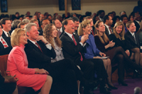 [PHOTO: President Clinton and Vice 
President Gore share a happy moment with their families on Inauguration
Day]