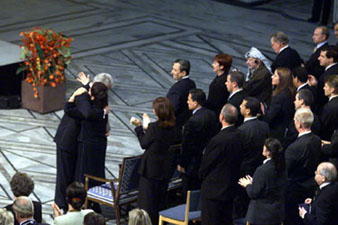 Leah Rabin embraces the President at the commemoration ceremony for her late husband.