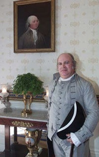 To honor President John Adams's arrival at the White House 200 years ago, President Adams is portrayed for today's reenactment ceremony by Steven Perlman of Philadelphia.  He is posing here in front of President Adams's portrait in the Blue Room.