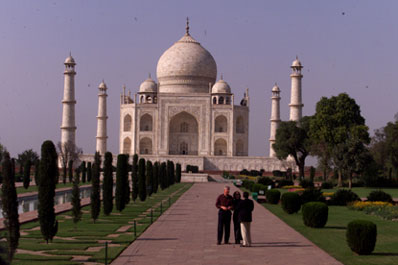 The President and Chelsea Clinton listen to their tour guide at the Taj Mahal.  Agra, India.