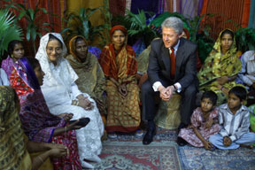 President Clinton and Prime Minister Sheikh Hasina participate in a microcredit event at the US embassy, Bangladesh.