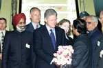 President Clinton and daughter Chelsea are greeted by Indian officials upon their arrival at Palam Air Force Station, New Delhi.
