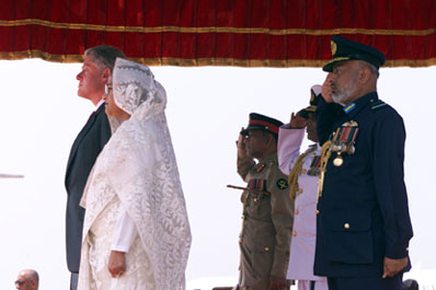 President Clinton and Prime Minister Sheikh Hasina at the official arrival ceremony at Zia International Airport, Bangladesh.