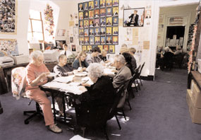 The walls in Presidential Student Correspondence are covered from floor to ceiling with original artwork sent to the President by young people from all over the globe. Here, volunteers help the President respond to more than 2,000 pieces of mail each day.