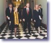 The President with USAID Administrator Atwood, Secretary Albright, Sandra Thurman, and Christopher Jennings arriving at White House World AIDS Day Commemoration (12/1/98)